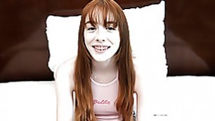 This redheaded teen slobbers all over a fat cock