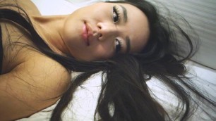 Asian adult model Estelle Lela Angels playes in bed