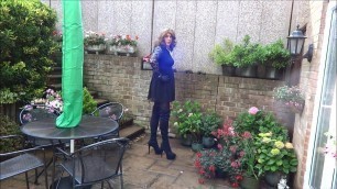 Wanking and plugged in the garden in Thigh High Boots