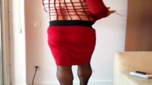 Big boob cross dresser smoking red dress.