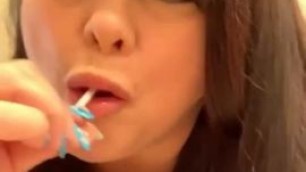 Marcy Diamond giving sloppy blowjob to lollipop with tons of spit