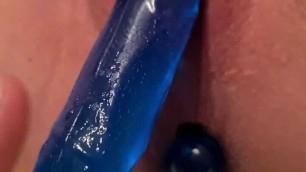 Having a double dildo in my pussy and ass. After I cum, I suck and lick a big cock.